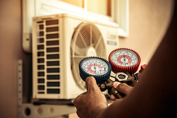 Professional Air Conditioning Service technician working in Owings Mills, MD